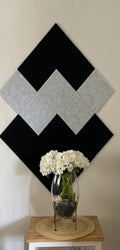 Diamond-shaped PET felt acoustic panels creating a contemporary geometric feature wall