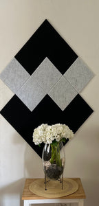 Diamond-shaped PET felt acoustic panels creating a contemporary geometric feature wall