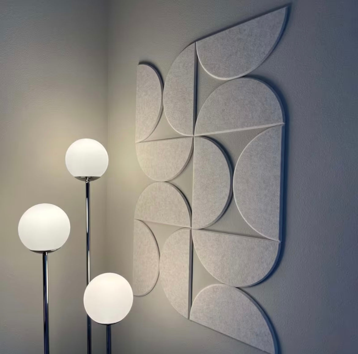 Semi-circle PET felt acoustic panels installed in a modern home to reduce echo and enhance interior design.