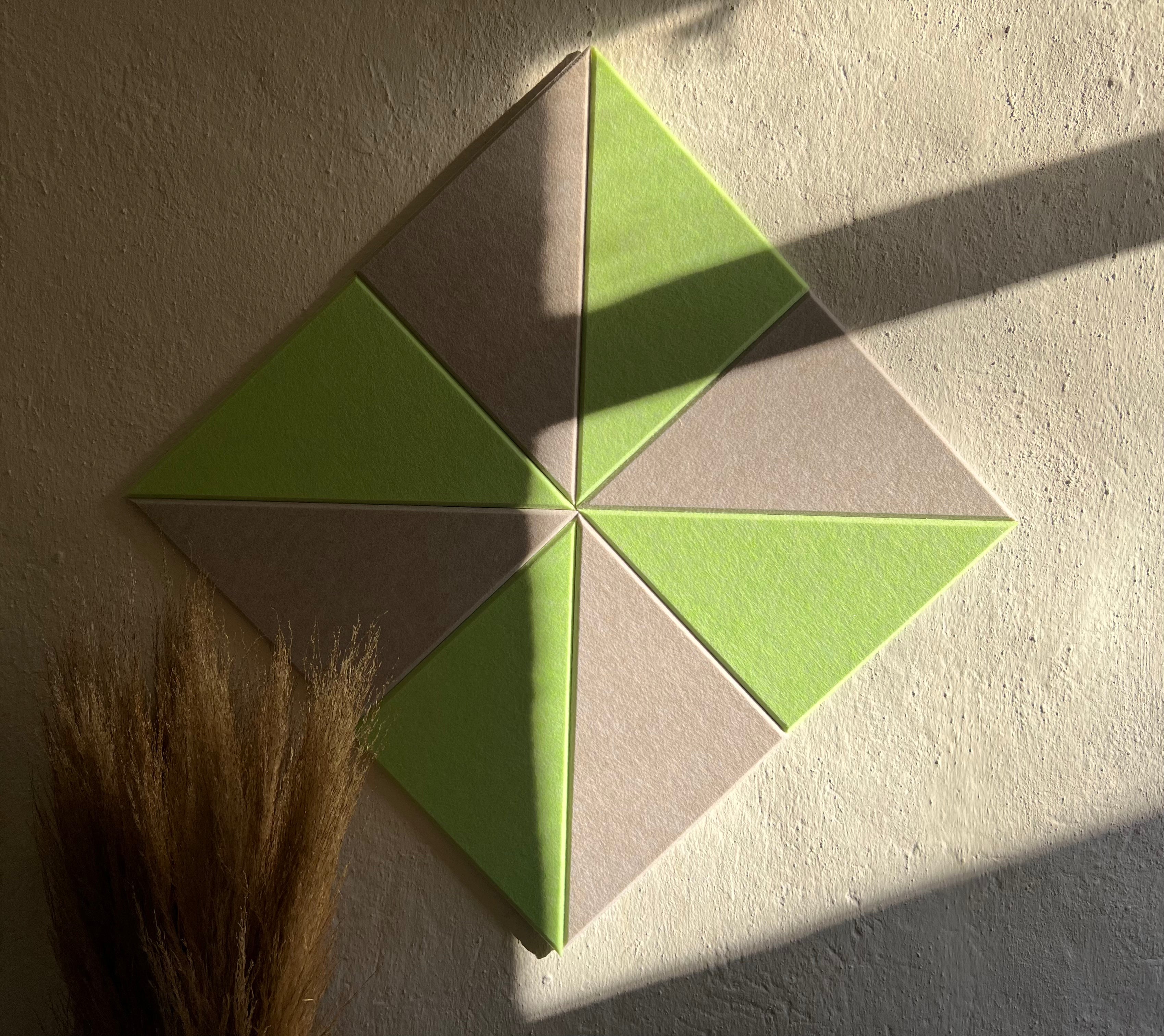 Triangle PET felt acoustic panels arranged into creative geometric wall designs for modern interiors